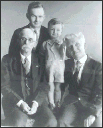 Photo of Elmore, Everett,  
Everett, Jr., and Charles