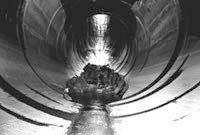 Photo showing damage to spillway.
